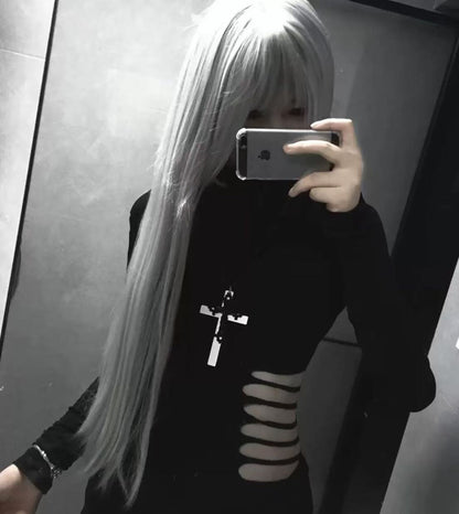 Woman wearing WEIX black asymmetric cutout top showcasing a modern alternative style and fitted look